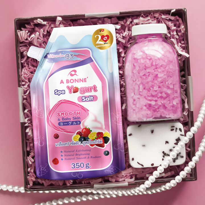 Abonne Spa Yogurt Salt 350g Abonne Spa Yogurt Salt 350g Pink spa product set with A Bonne Spa Yogurt Salt packaging on a pink background
