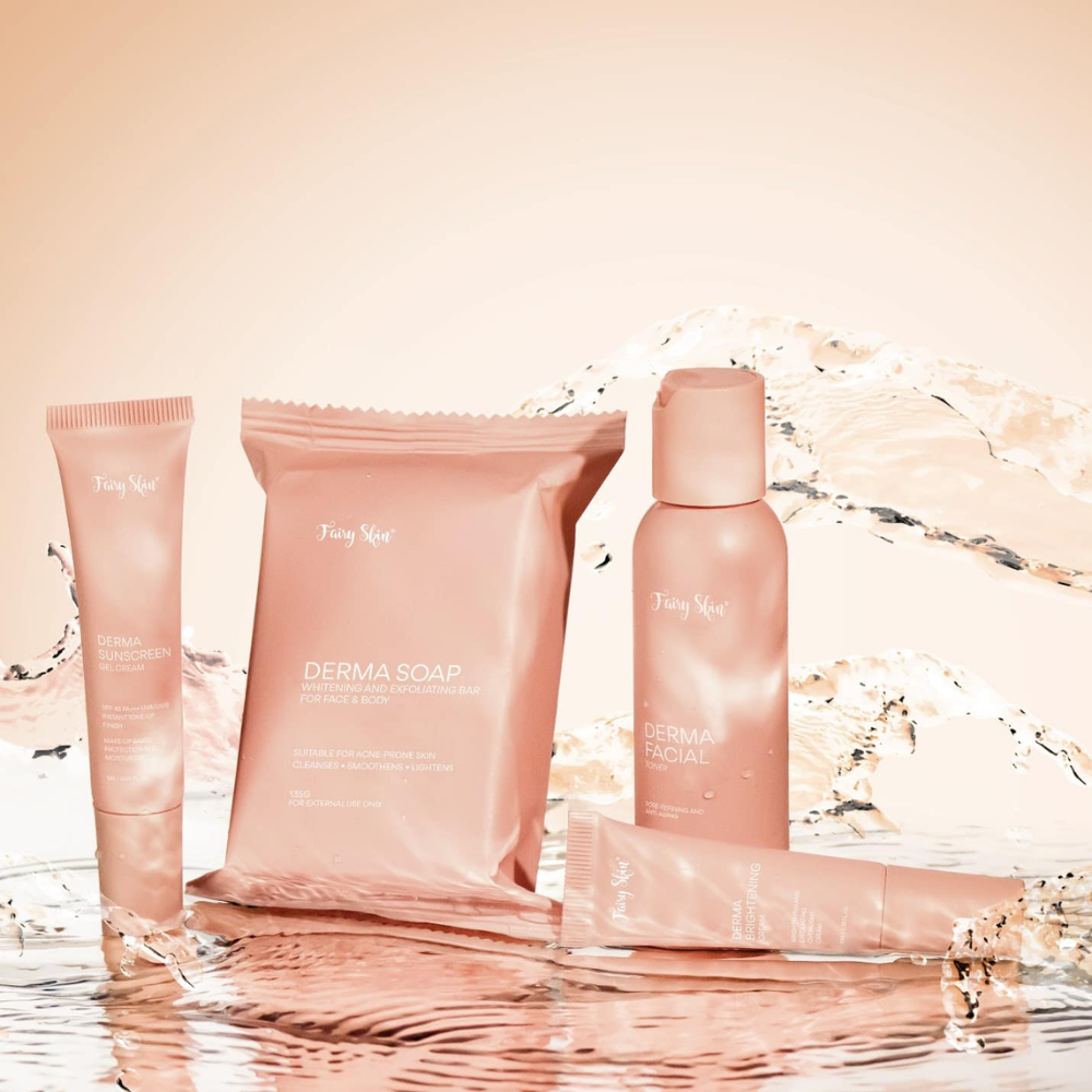 Set of pink skincare products with 'Two You' branding on a reflective surface. Fairy Skin  Derma Facial Kit - Pimple Fighting and Skin Renewing