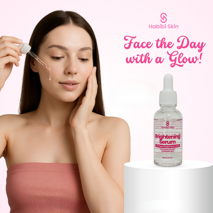 Woman applying skincare serum with Habibi Skin branding on a pink background Habibi Skin Brightening Serum with 2% Pure Hyaluronic Acid with Green Tea 30ml