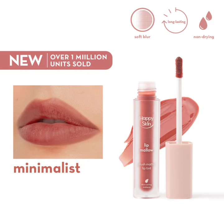 Lip balm with applicator and close-up of lips, labeled 'Happy Skin' on a white background. Happy Skin Lip Mallow Plush Matte Lip Tint