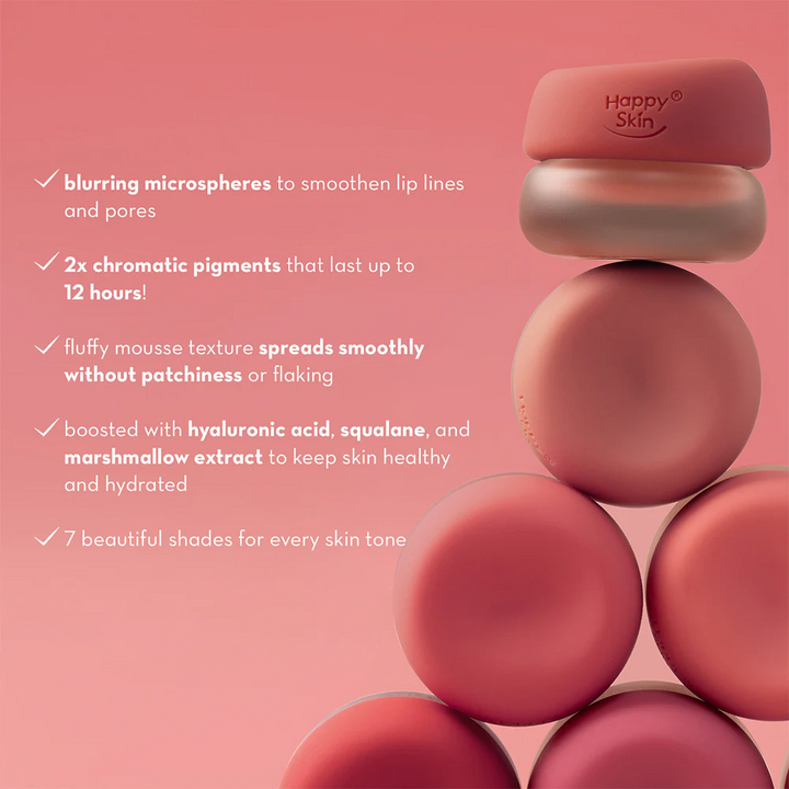 Stack of lip products with Happy Skin branding on a pink background, featuring product features.