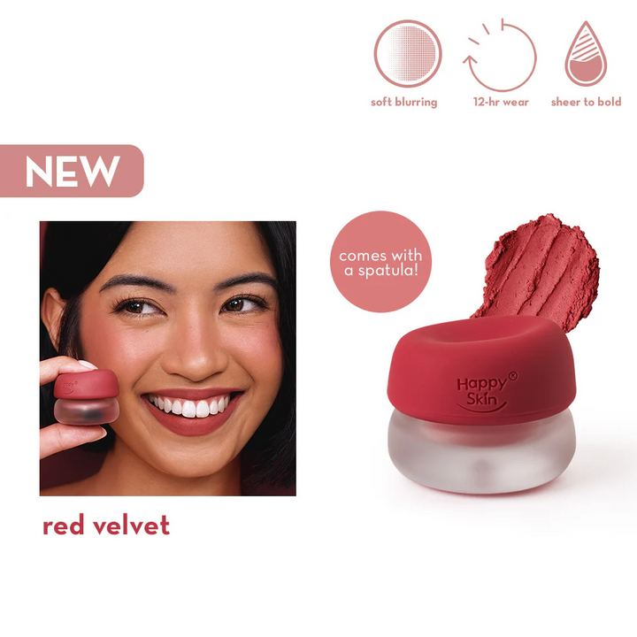Red velvet makeup product with a woman applying it, featuring 'Happy Skin' branding.