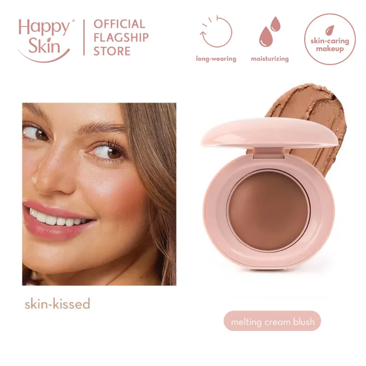 Happy Skin compact with a woman's face showing blush application, featuring long-wearing, moisturizing, and skin-caring makeup benefits.