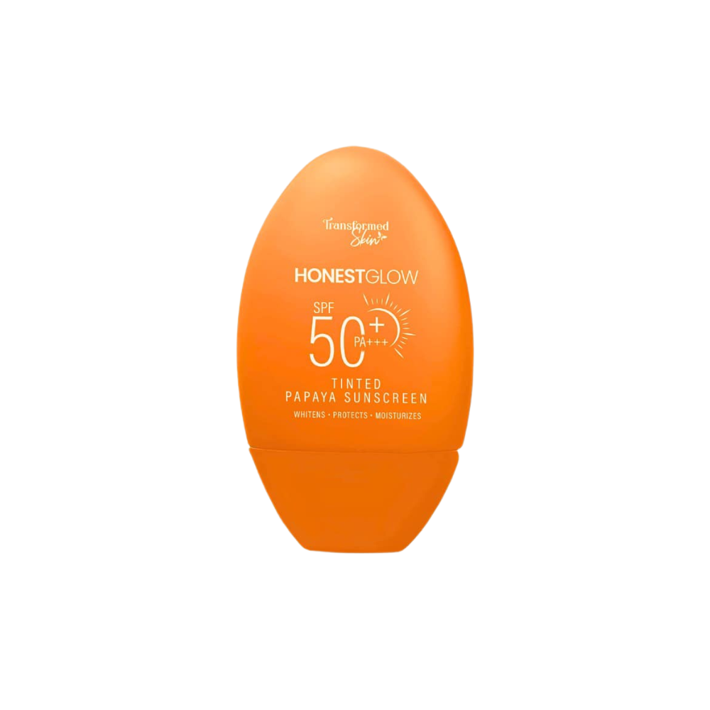 Orange sunscreen bottle with 'Honest Glow' branding on a white background