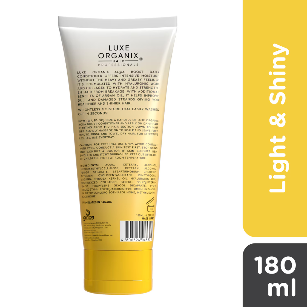 Luxe Organix hair care product tube with yellow and white design on a white background
