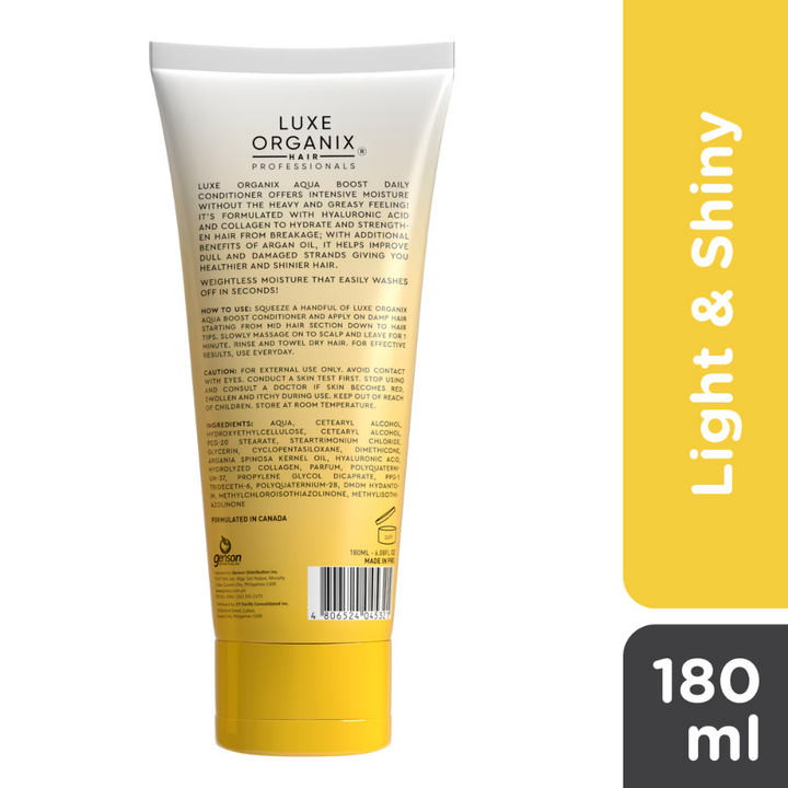 Luxe Organix hair care product tube with yellow and white design on a white background