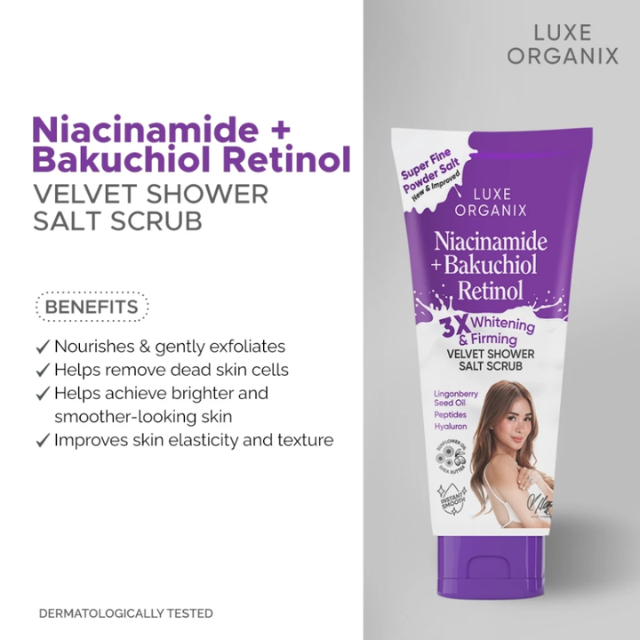 Purple tube of Luxe Organix Niacinamide + Bakuchiol Retinol Velvet Shower Salt Scrub with text on a gray background Luxe Organix Niacinamide + Bakuchiol Retinol 3x Whitening & Firming Velvet Shower Salt Scrub
