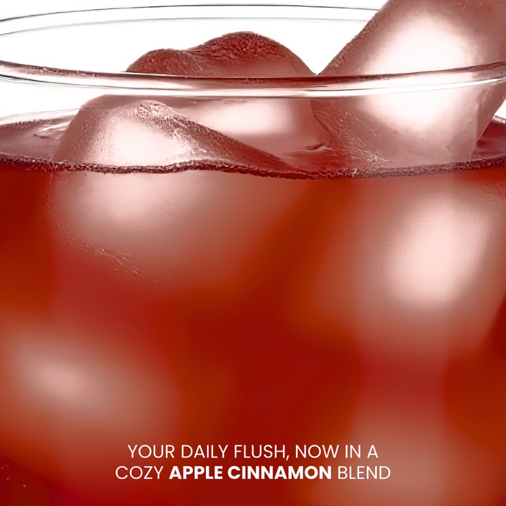 Close-up of a glass with a red beverage and ice cubes, with text overlay.Luna Aura Hope Glow Crystal - Apple Cinnamon Kombucha, Probiotic and Prebiotic Fiber Juice Drink