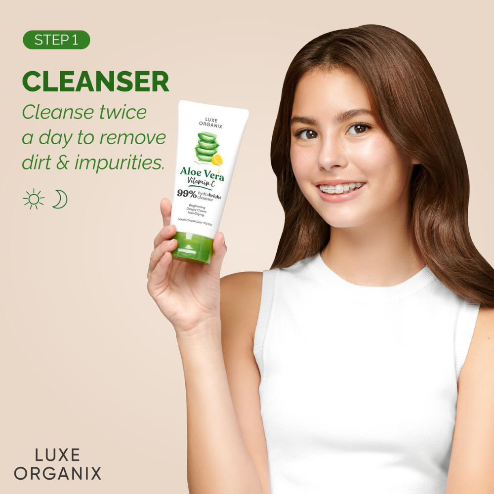 Woman holding Luxe Organix Aloe Vera Vitamin C Hydrabright Glow Cleanser - 120ml for daily dirt and impurity removal