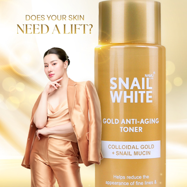 Snail White Gold Anti-Aging Toner bottle with a woman in a beige suit on a yellow background