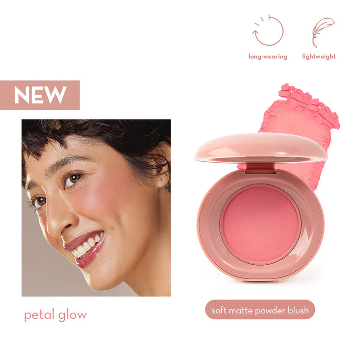 Pink blush compact with a woman's face wearing it, labeled 'petal glow'.