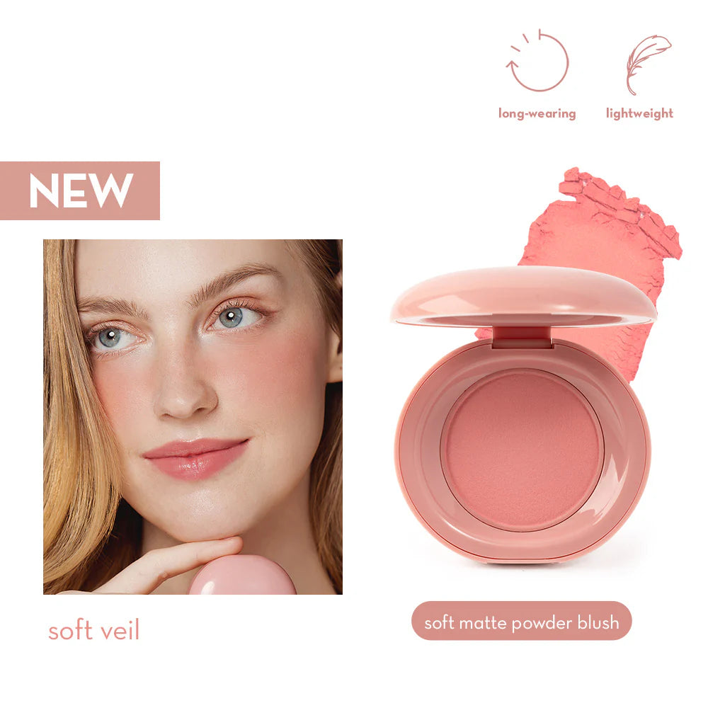 Blush compact with a woman's face showing blush application, labeled 'soft veil'.