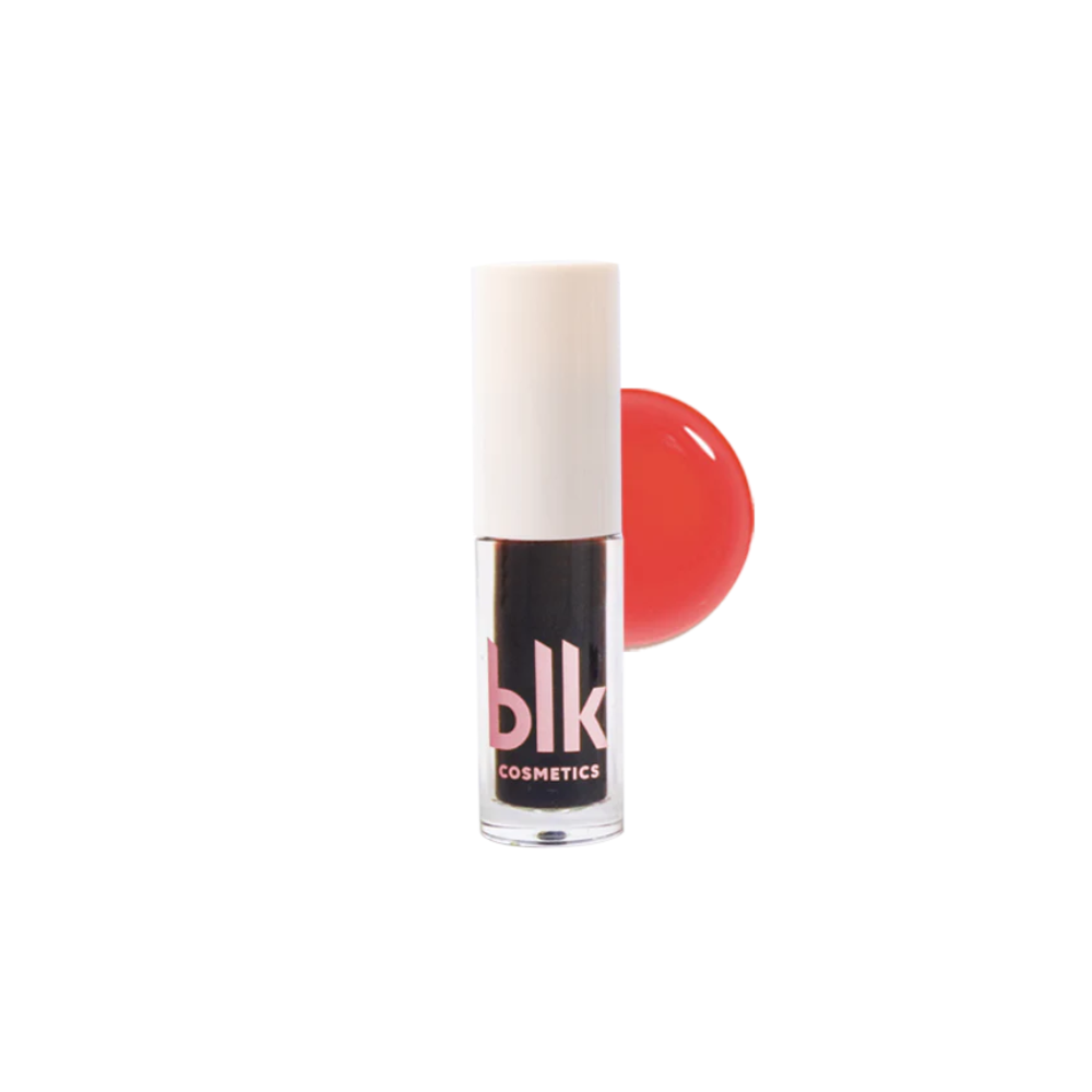 Lip and Cheek Water Tint by blk cosmetics with sleek packaging and vibrant red tint swatch on white background