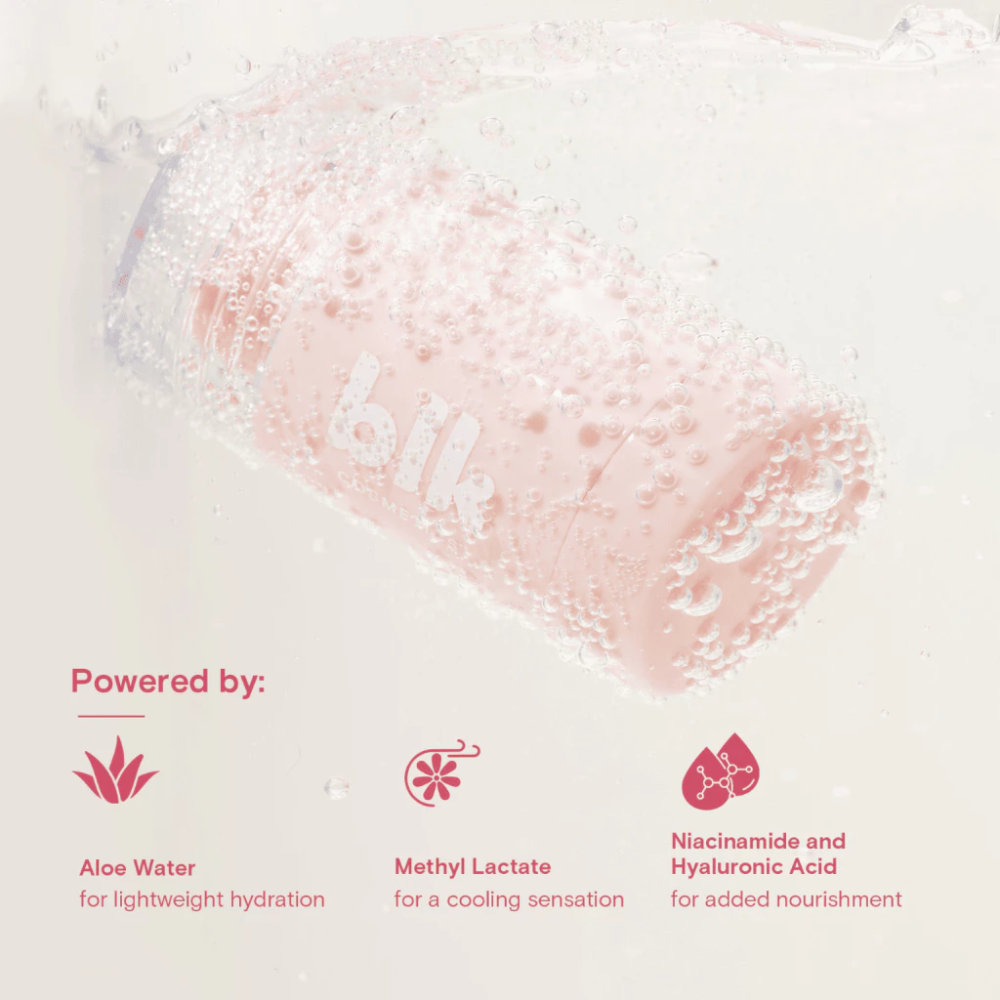 Cosmetic roller with pink gel and text detailing ingredients on a light background Blk Cosmetics Cooling Primer Stick