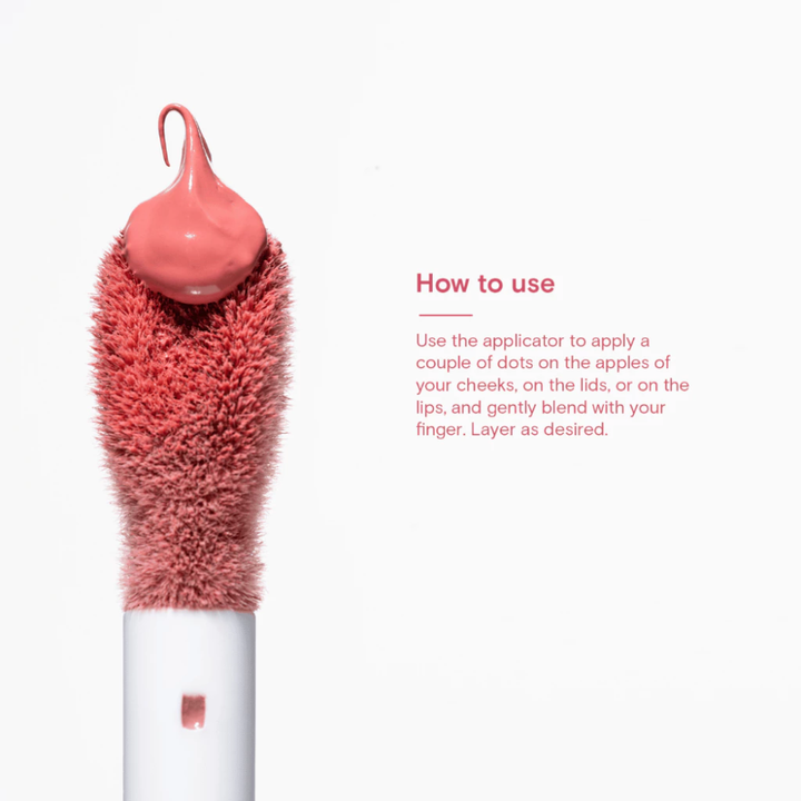 Cosmetic applicator with pink bristles and a white handle on a white background Blk Cosmetics Creamy All-Over Paint - Pink Cloud