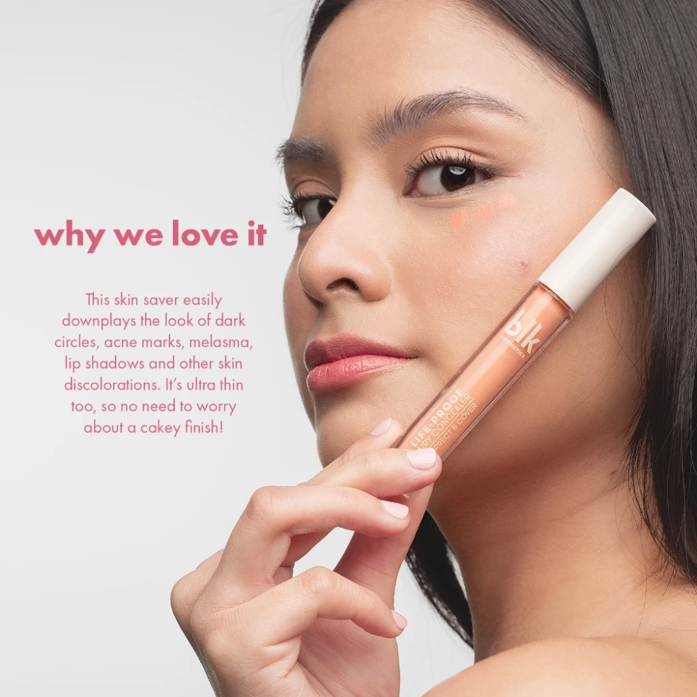 Woman applying makeup with a skin savior product on a light background Airy Concealer - Correct & Cover