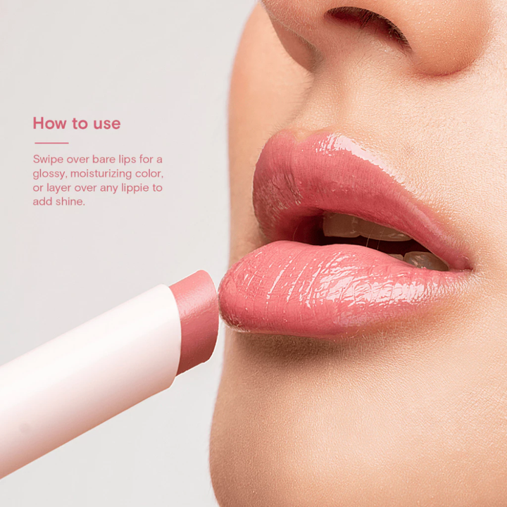 Lipstick being applied to lips with text on how to use blk cosmetics Glossy Serum Stick