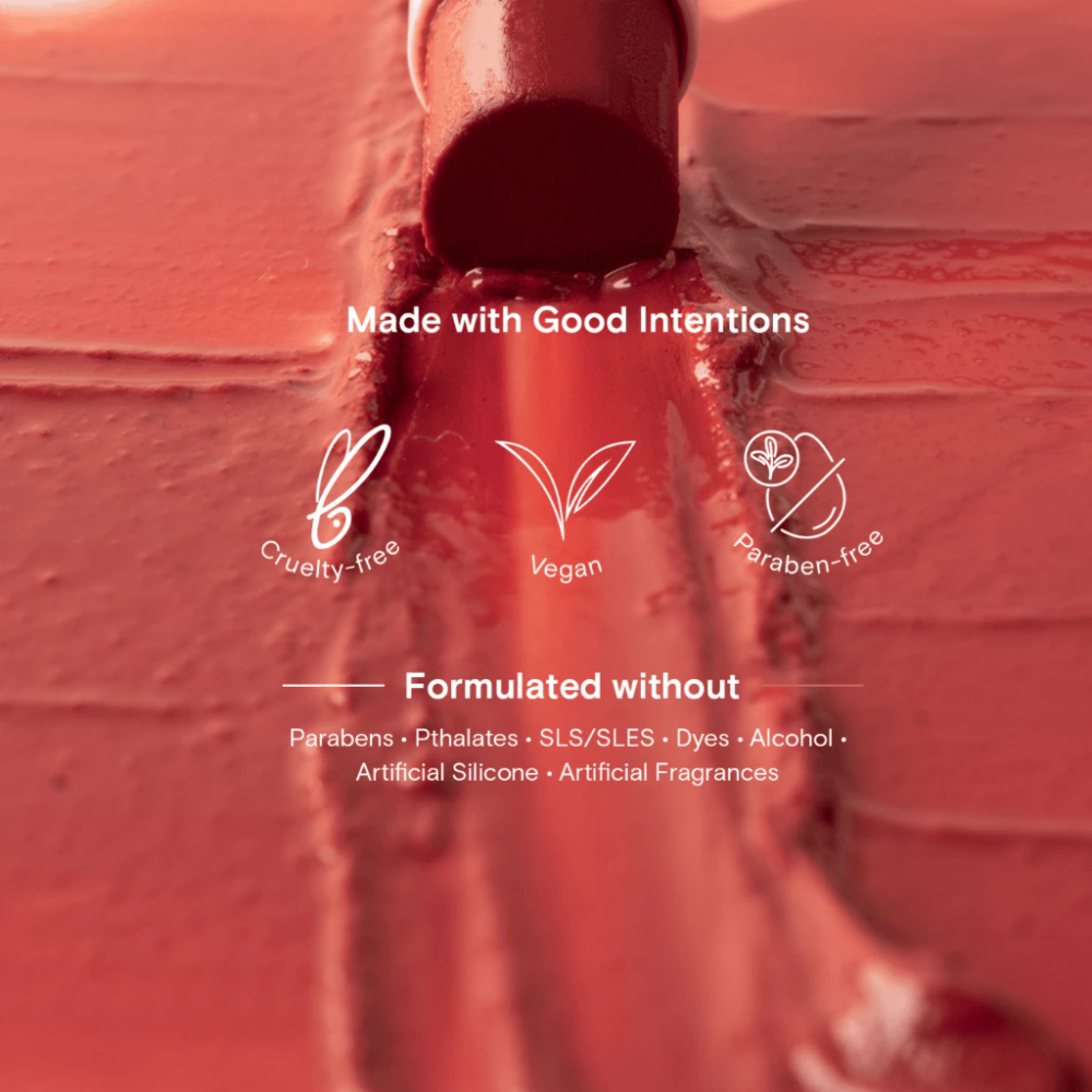 Red bottle with 'Made with Good Intentions' text and icons on a red background blk cosmetics Glossy Serum Stick