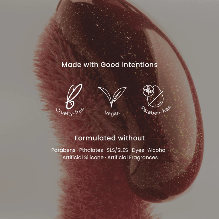 Cosmetic brush with 'Made with Good Intentions' text and icons on a gradient background