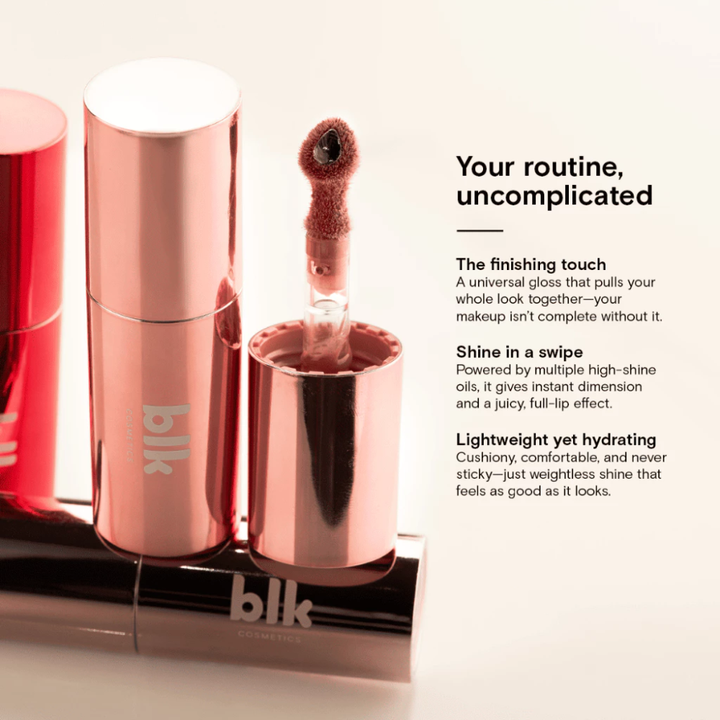 Rose gold lip gloss with applicator and 'blk' branding on a light background Blk Cosmetics Hypergloss - Pearlescent Shine + Juicy Hydration